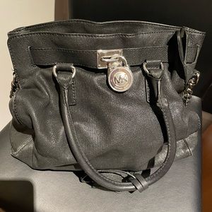 MK black purse. A little used on inside (pic) otherwise in great condition.